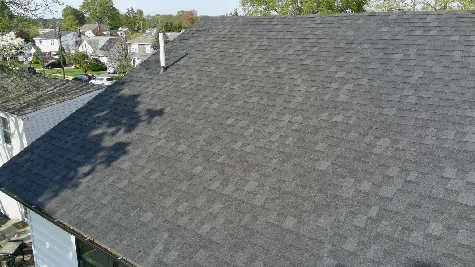 Finished residential asphalt shingle roof
